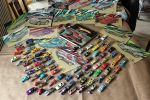 Hot Wheels models and drawings by Oscar Salerni together with Angelo Van Bogart's book celebrating 40 years